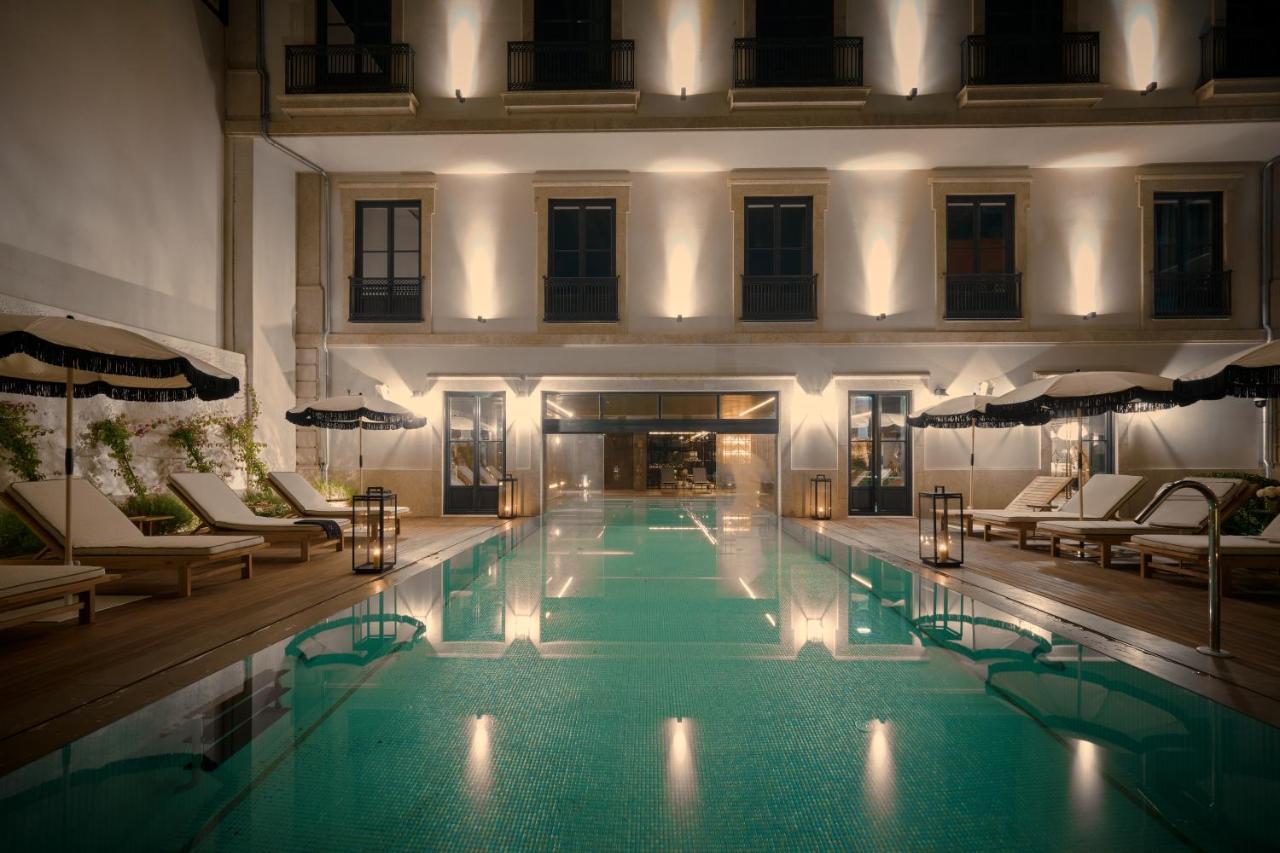 Ga Palace Hotel & Spa, A Xixth-Century Villa ポルト エクステリア 写真 The pool at the hotel