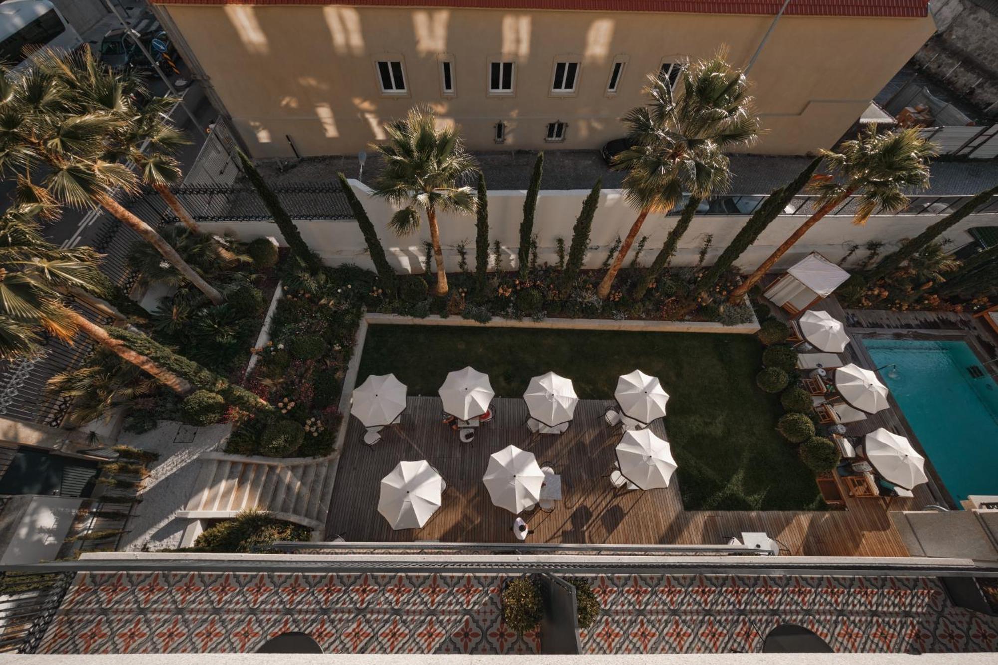 Ga Palace Hotel & Spa, A Xixth-Century Villa ポルト エクステリア 写真 The pool at the hotel